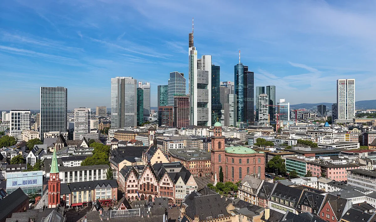 Frankfurt Römerberg square with timbered houses and the skyline behind — 2